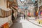 Local people on a street in Stone Town. Stone Town is the old part of Zanzibar City, the capital of Zanzibar, Tanzania