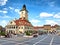 Local people and tourists relaxing in Brasov Council Square