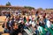 Local people and tourists watching Desert Festival performance,