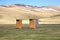 The Local Restroom at Song kul lake , Naryn with the Tian Shan mountains of Kyrgyzstan