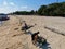 The local sea gypsy people do beach cleaning in Mabul Island, Semporna. Sabah, Malaysia. Borneo.