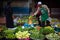 Local seller selling fruits and vegetables