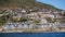 Local South African township housing residence area around Hout Bay hill side landscape from ocean