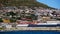 Local South African township housing residence area around Hout Bay hill side landscape from ocean