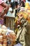 A local trader selling spices at a street market in Accra, Ghana