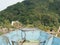 Local traditional Thai wooden long tail boat of fishermen heads toward the coast of Island