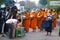 Local Villagers give Foods and rice to Buddha Monks in the morning
