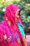 Local woman in colorful sari visiting Fatehpur Sikri in Uttar Pr