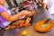 Local woman cooking meat for asado at Mercado 4 in Asuncion, Par