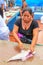 Local woman cutting fish at the market in Puerto Ayora on Santa