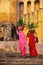 Local women carrying pots with plants on their heads at Amber Fort, Rajasthan, India