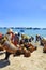 Local women are cleaning their baskets which were used for transporting fishes from the boat to the truck