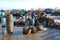 Local women are cleaning their baskets which were used for transporting fishes from the boat to the truck