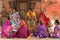 Local women gathering on a street of Nepal's capital city Kathmandu in a sunny afternoon