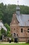 Locals in front of Chapel Natte Bampt. Domein Bokrijk, Genk, Belgium