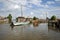 Locals move around the streets by boat. The Ob river, which came out of the banks, flooded the outskirts of the city.