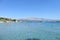 Locals and tourists enjoying a beautiful summer day along the sandy beaches of Lumbarda Beach on Korcula Island, Croatia