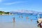 Locals and tourists enjoying a beautiful summer day along the sandy beaches of Lumbarda Beach on Korcula Island, Croatia