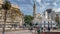 Locals and tourists walk in historic Plaza de Mayo in Buenos Aires, Argentina.