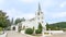 Location photos Tall European Church The pitched roof has a cross that sends devotion to God in heaven.