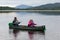 LOCH INSH, BADENOCH and STRATHSPEY/SCOTLAND - AUGUST 25 : Two women paddling a canoe on Loch Insh near Aviemore Scotland on