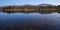 Loch Morlich with Glenmore Forest and Cairngorm mountains