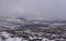 Loch Vrotachan on a cold bleak day on the Plateau above the Glenshee Ski Resort with a light dusting of Snow.