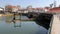 Lock on the dam by The Old Bridge, Ponte Velha, over Nabanus River, Tomar, Portugal