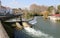 Lock on the dam by The Old Bridge, Ponte Velha, over Nabanus River, Tomar, Portugal