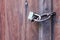Lock key on old wooden door.