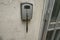 Lockbox with keys on the wall of the apartment. Home safety. Home entrance