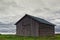 Locked Barn Under The Clouds