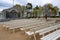 Locked open air stage and empty spectator benches near the beach during the coronavirus pandemic in the famous tourist resort