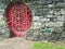 Locked red door at Chinese garden with do not enter sign