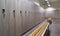 Locker room with wood benches and wooden lockers