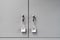 Lockers cabinets in a locker room at school or museum or station.Closeup padlock with key number hanging on locker for concept