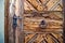 Locking mechanism and knocker of an ancient wooden door