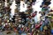 Locks as the symbol of love on the grid of water mill in Prague