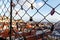 Locks on the cage, Old city on a background