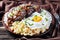 Loco moco on a clay plate, close-up