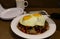 Loco Moco , traditional Hawaiian cuisine , burger patty on rice with a fried egg and brown gravy sauce