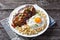 Loco moco on a white plate, close-up