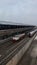 Locomotive and train carriages parked on different tracks at the Solo Balapan Station