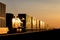 Locomotive and Train Carrying Shipping Containers in Golden Sunset on the Canadian Prairie