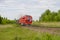 Locomotive of the train moves along the railway