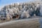 Lodge in an alpine region, covered with hoar frost, rime