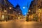 Lodz, Poland - August 24, 2023: Beautiful architecture of Piotrkowska Street in Lodz city at dawn, one of the longest commercial