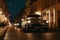 lofi street with vintage cars and old-timey street lamps