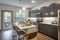 lofie kitchen with sleek modern appliances and cozy breakfast nook