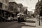 lofitown street, with vintage cars and trams passing by